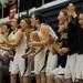 The Saline bench cheers in the game against Woodhaven on Tuesday, March 5. Daniel Brenner I AnnArbor.com